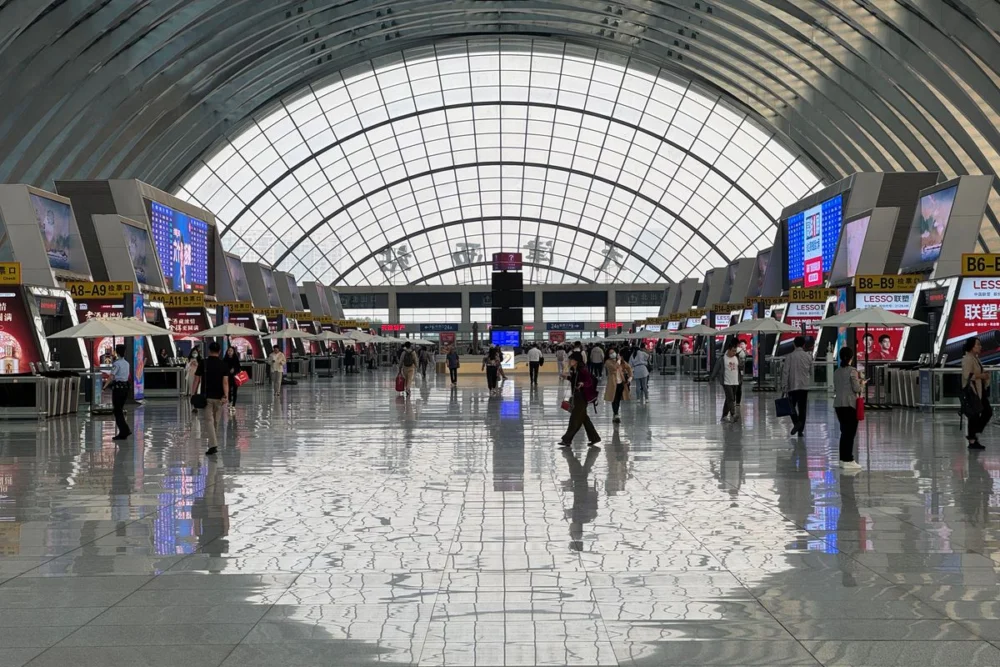 Arched glass roof of an airport terminal hall